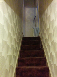 Plastering over Artex walls